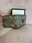 Gucci x Disney GG Supreme Donald Duck billfold wallet